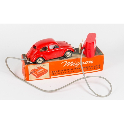 854 - A Scarce model of a Mignon No: A2 Volkswagen Beetle finished in Red complete with remote control. Mo... 