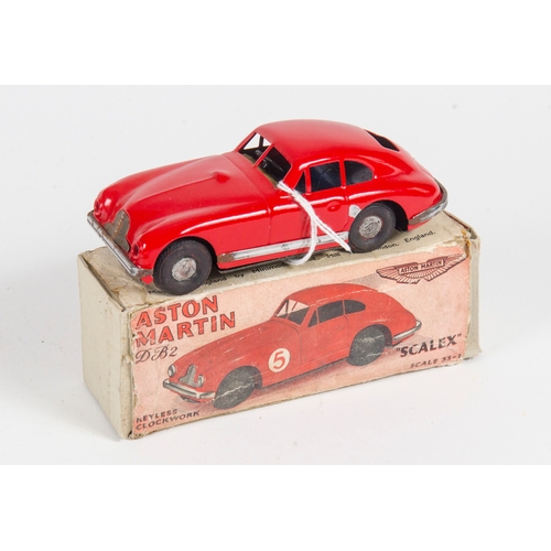 865 - Scalex Aston Martin DB2 finished in Red in working order. Model in Good Repainted Condition with a P... 