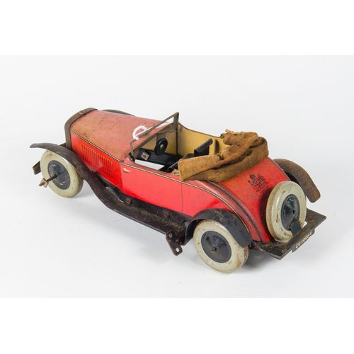 872 - Chad Valley Clockwork Tinplate Car finished in Red with a Canvas Soft Top & black interior in Fair/G... 