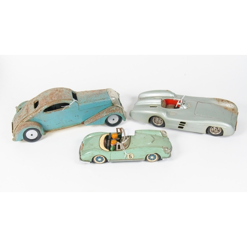 875 - Tin Plate including Large Clockwork 1930’s style car with key measuring 290mm in length. Large frict... 