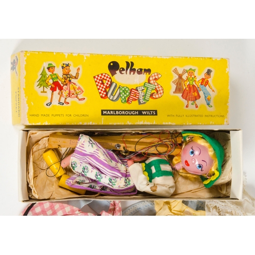 912 - A Boxed Pelham Puppet and a Celluloid Doll Both in Good Condition.