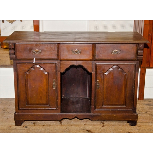 471 - An Edwardian Art Nouveau design Side Board stained in oak, fitted 3 drawers, 2 cupboards and central... 