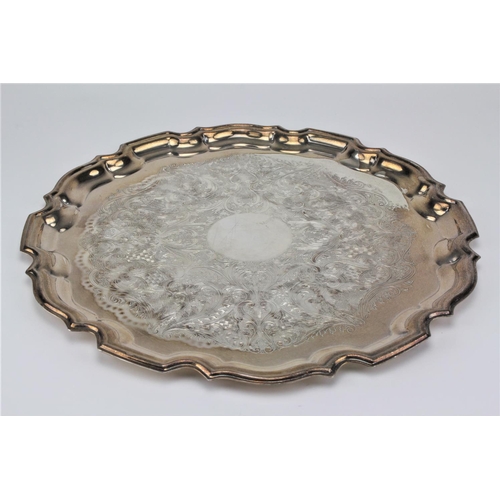 132 - A Large Silver Circular Salver, Birmingham R with engraved decoration. 1027 gms.