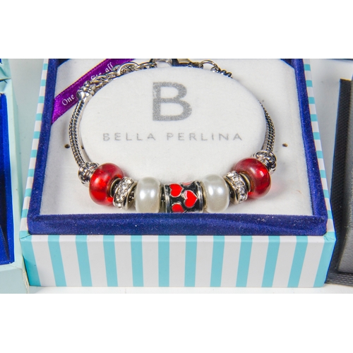 139 - A Silver Set Pendent, a pair of similar earrings and a Bella Perlina bracelet.