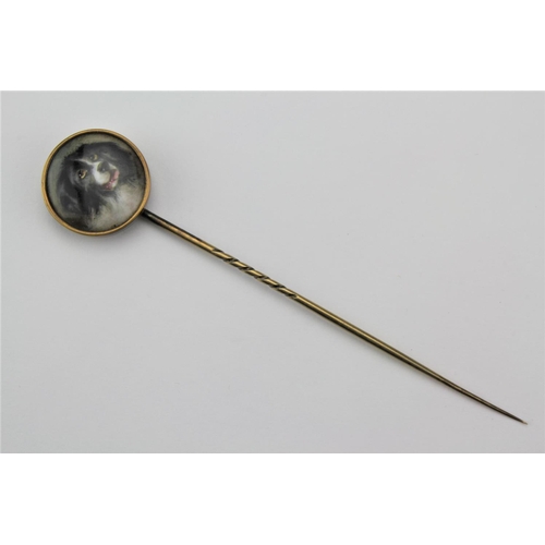 141 - A signed and dated Essex Crystal stick pin, picturing a spaniel.