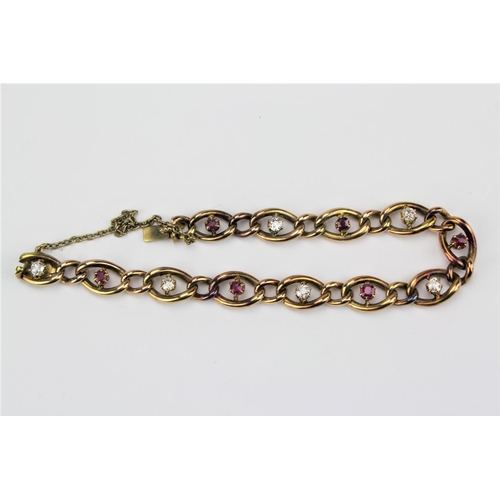 142 - A Victorian gold curb bracelet, set with diamonds and rubies. 16.3 grams.