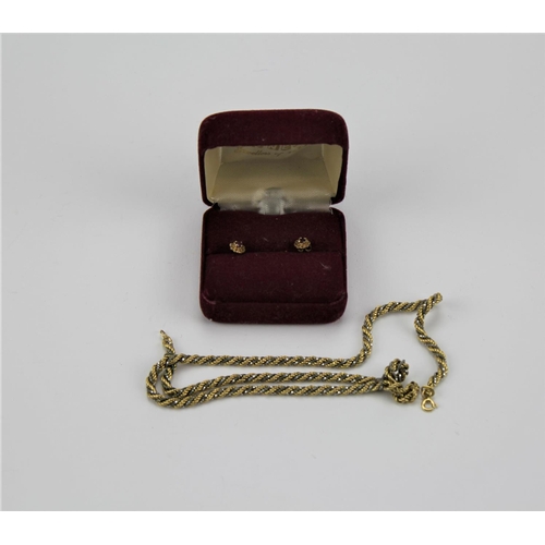 146 - A 9 carat gold twist link necklace, along with a pair of stud earrings.