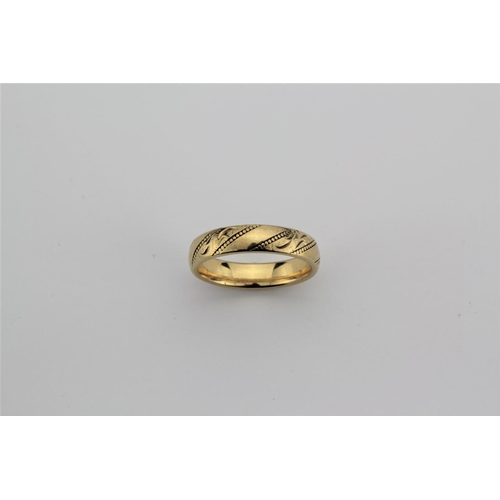 171 - A 9 carat gold wedding ring. 3.3 grams.