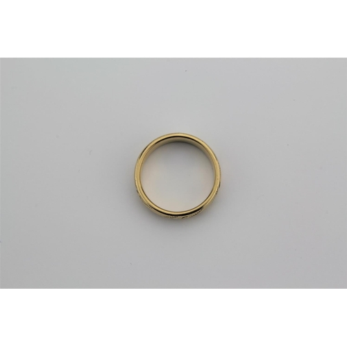 171 - A 9 carat gold wedding ring. 3.3 grams.