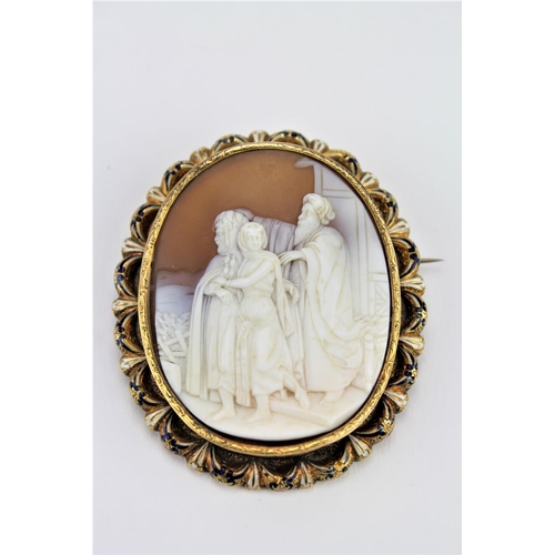 184 - A Victorian cameo brooch, set in a gold frame, depicting a biblical of Moses and Attendants.