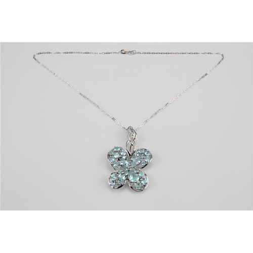 193 - An 18 carat white gold aqua marine pendant, on a chain.