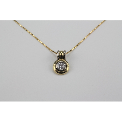 196 - An 18 carat gold diamond bullet pendant, on a fine chain, mounted with a diamond of half a carat.