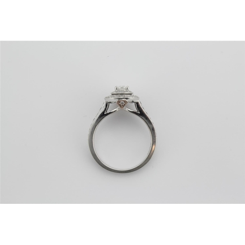 198 - A platinum mounted diamond cluster ring, 3 quarters of a carat.