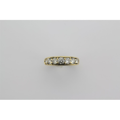 201 - A ladies 7 stone diamond ring, set in 18 carat gold, weight approx a carat.