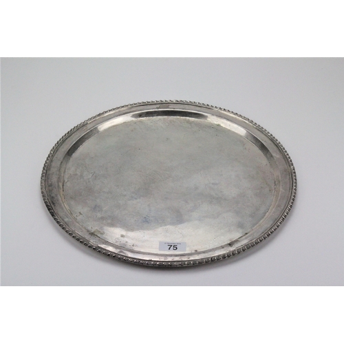 75 - A circular Mexican silver salver, marked Sterling 925, makers mark JR. 994 grams.