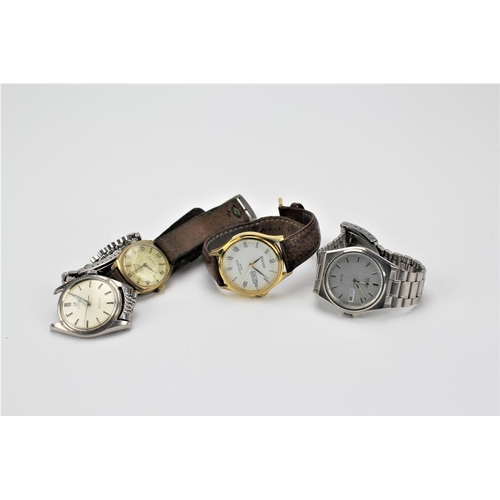 61 - An Omega Seamaster Wrist Watch in Stainless Steel, A Garrard Wrist Watch in Gold Colour, a Seiko & a... 