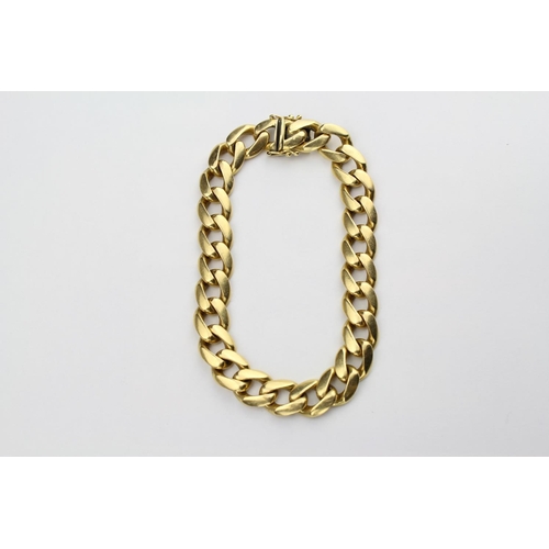 93 - An Italian 18k Curb Link Bracelet. 
81.6 gms.