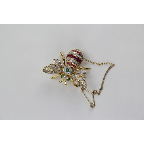 159 - A 1920's Bee brooch, mounted with various Diamonds, Ruby's and Emeralds with moving wings and safety... 