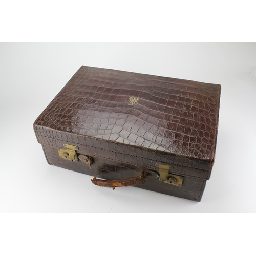 200 - A Large Gentleman's Crocodile Skin & Silver mounted Dressing Table Set including Cologne, Perfume, H... 