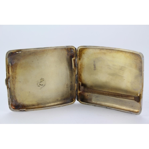 41 - A Large Victorian silver engraved cigarette case.