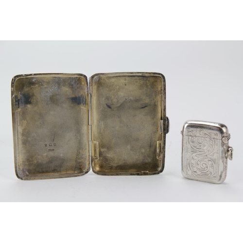 30 - A Victorian silver engraved Cigarette case and a silver vesta case.