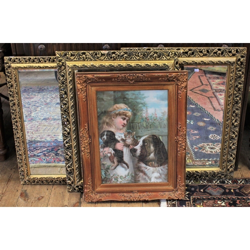 299 - A pears print in a gilt frame, along with two gilt framed mirrors.