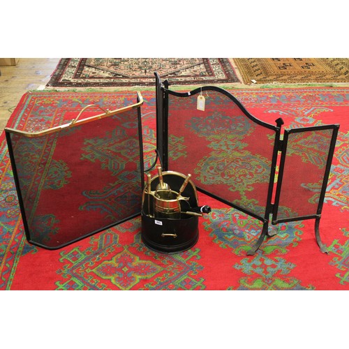 285 - A brass fire side set, coal bucket, fire screen etc.