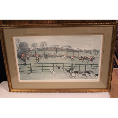 601 - A framed horse and hound hunting  picture.
W.31inch x H.21inch frame size.