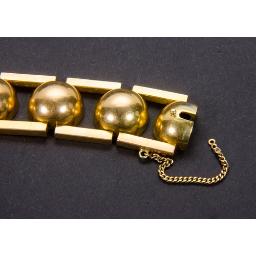 138 - An 18 Carat Gold Ball and Bar Bracelet, modernist design, marked 18K, possibly after a design to 