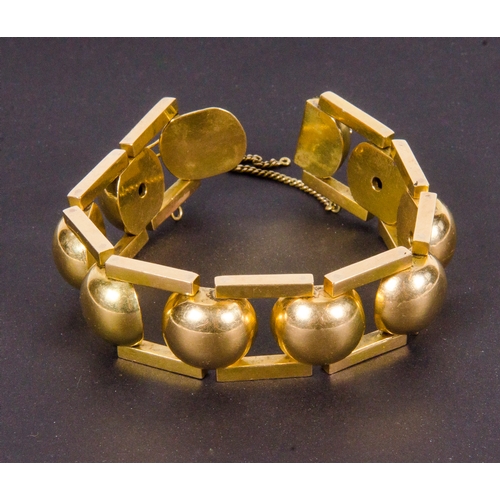 138 - An 18 Carat Gold Ball and Bar Bracelet, modernist design, marked 18K, possibly after a design to 