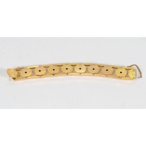 138 - An 18 Carat Gold Ball and Bar Bracelet, modernist design, marked 18K, possibly after a design to 