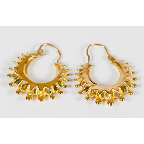 122 - A pair of Turkish ball and cluster earrings (2.1 grams)
along with a pair of swirl pattern gold earr... 