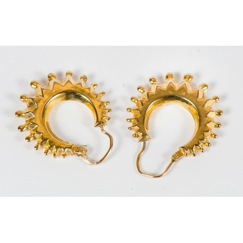 122 - A pair of Turkish ball and cluster earrings (2.1 grams)
along with a pair of swirl pattern gold earr... 