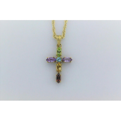 77 - A 9 carat gold cross necklace, set with various coloured stones, set on a gold chain. 4.8 grams