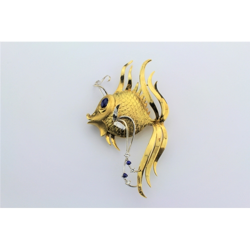 75 - A 1950's design stylish gold  brooch, mounted with sapphires and diamonds, designed as a fan tailed ... 