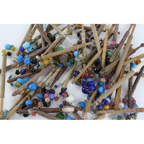 612 - A large collection of 18th & 19th century bead work & other bobbins.