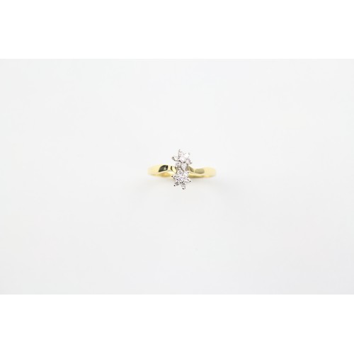 110 - A ladies diamond cluster ring, set with small diamonds, in an 18 carat gold setting. Size L.