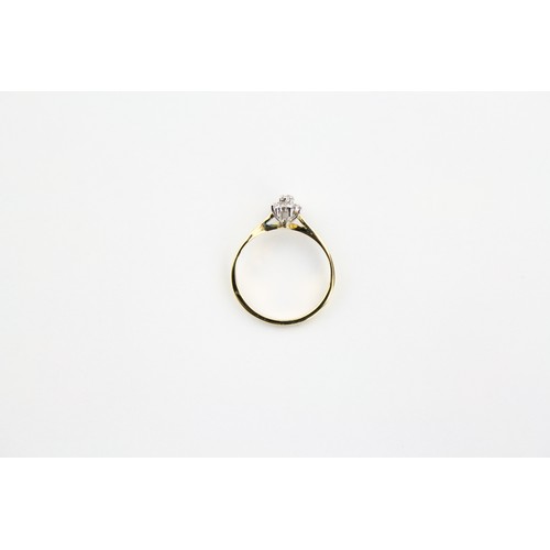 110 - A ladies diamond cluster ring, set with small diamonds, in an 18 carat gold setting. Size L.