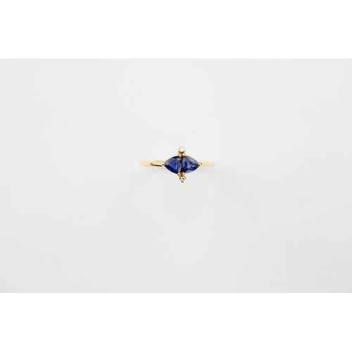 116 - A ladies sapphire coloured and diamond dress ring. Size O.5