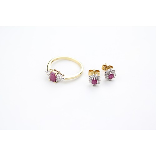 103 - A gold ruby and diamond dress ring, along with a pair of matching earrings. Size O.