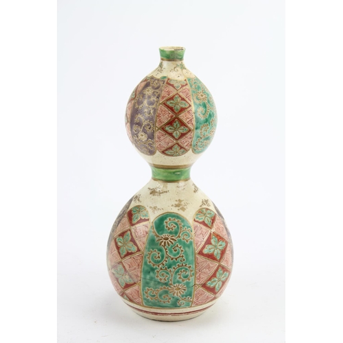 526 - A late 17th century design kutani vase, double guled, narrow necked, decorated in red green and gold... 