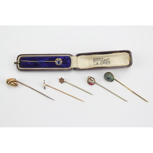 126 - A scarab tie pin, true lovers knott and other tie pins.