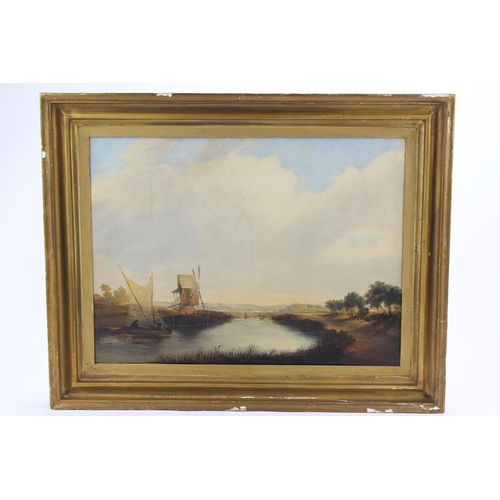 549 - A late 19th century oil on board, of a Dutch windmill.