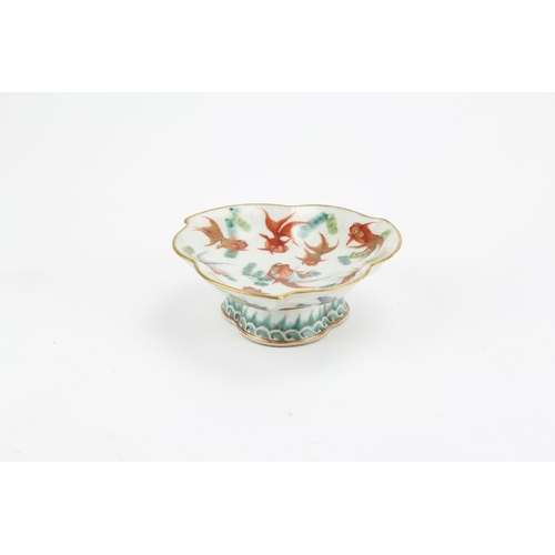 511 - Ching Dynasty Tung Chin 1862-1874 lotus leaf petal dish, red gold fish decorated, resting on a shape... 