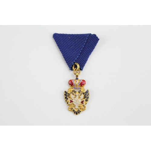 640 - Part of a collection of European orders and decorations, the order of the eagle Russian medal.