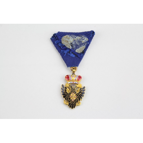 640 - Part of a collection of European orders and decorations, the order of the eagle Russian medal.