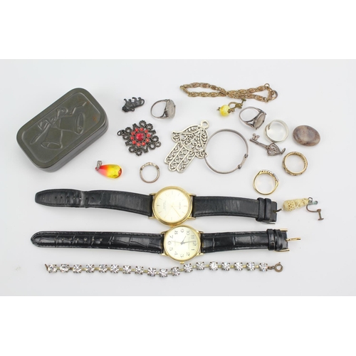 90 - A collection of costume jewellery, including silver rings, watches, tin etc.