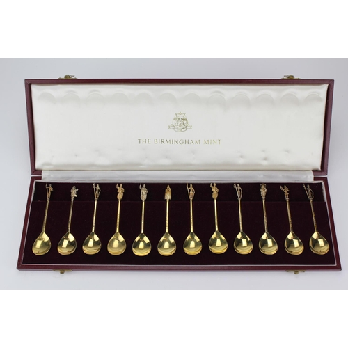 64A - The Birmingham Mint set of 12 apostle spoons, in silver gilt & the saints names in original case.