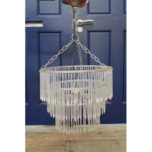 674 - A German frosted glass three tiered chandelier.