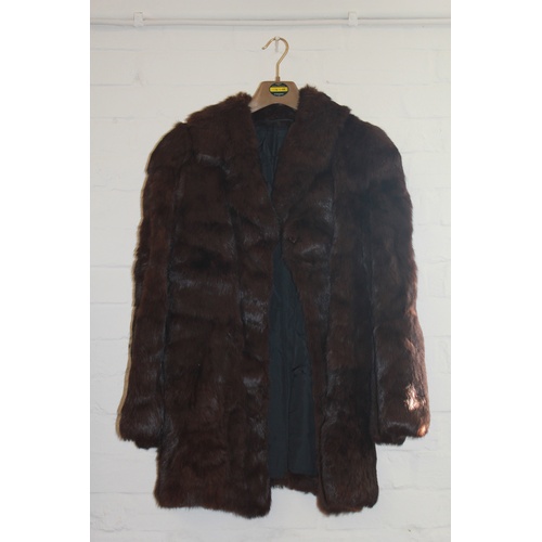 609B - A ladies three quarter length musk-wash fur coat and one other fur coat.